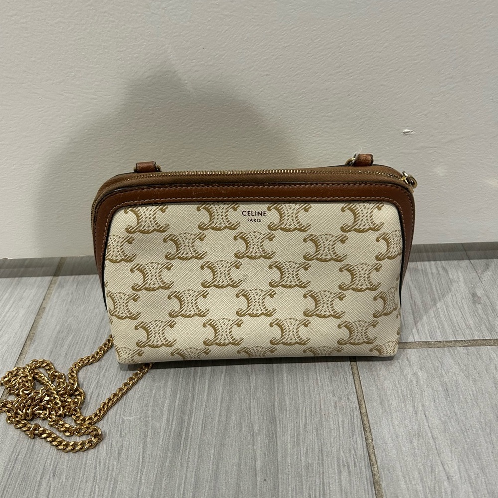 CLUTCH WITH CHAIN IN TRIOMPHE CANVAS AND LAMBSKIN